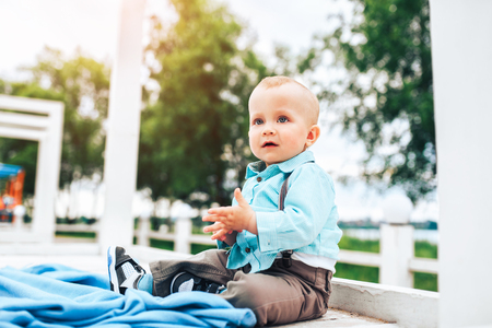 Cute little boy playing outdoor in the parkの写真素材