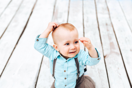 Cute little boy playing outdoor in the parkの写真素材