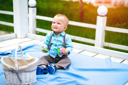 Cute little boy playing outdoor in the parkの写真素材