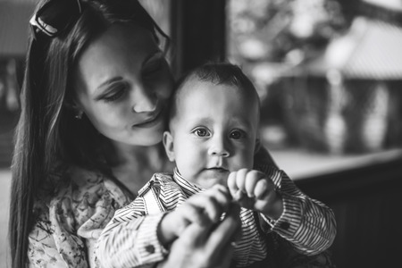 Mother with her little pretty baby boyの写真素材