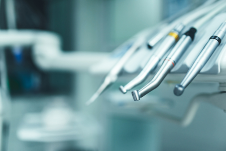Dental instruments closeup on the dental chair の写真素材