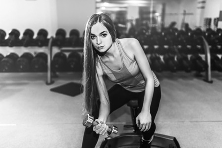 Pretty sporty girl training in the gymの写真素材