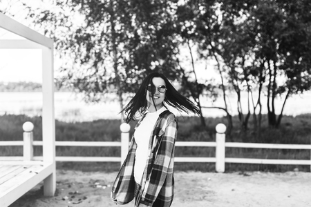 Laughing girl have fun outdoor in the parkの写真素材