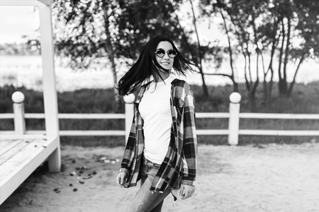 Laughing girl have fun outdoor in the parkの写真素材
