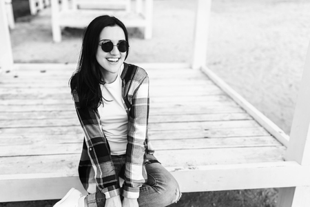 Young brunette girl relaxing outdoor in the parkの写真素材
