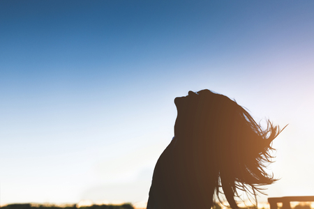 Silhouette of the young girlの写真素材