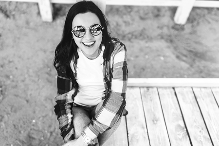 Young brunette girl relaxing outdoor in the parkの写真素材