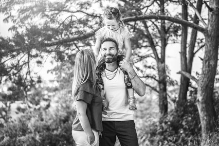 Happy lovely family have fun outdoorの写真素材