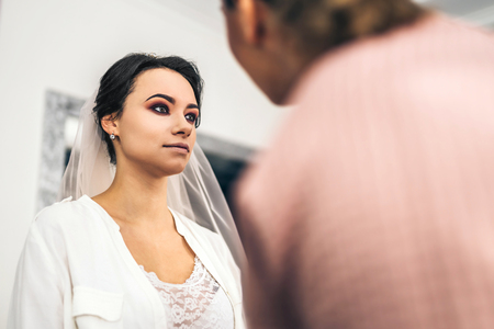 Beautiful bride on makeup before wediing の写真素材
