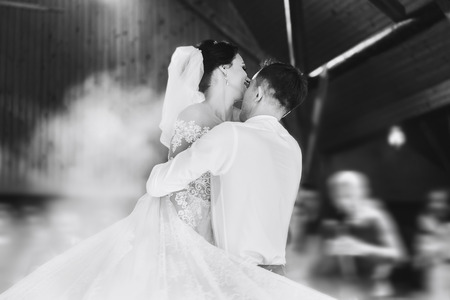 First dance of beautiful wedding coupleの写真素材