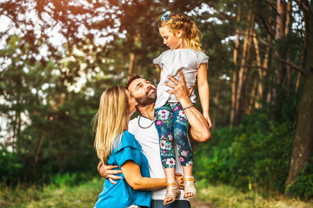 Happy lovely family have fun outdoorの写真素材