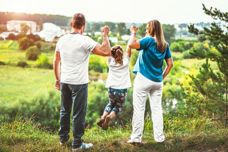 Happy lovely family have fun outdoorの写真素材