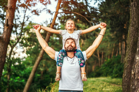 Father with his daughter have fun outdoorの写真素材