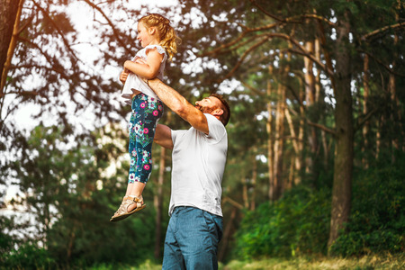 Father with his daughter have fun outdoorの写真素材