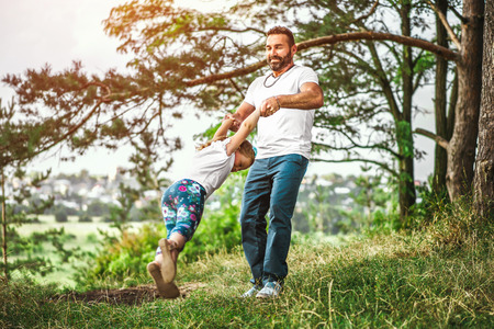 Father with his daughter have fun outdoorの写真素材