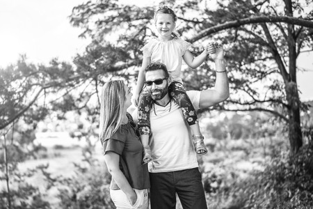 Happy lovely family have fun outdoorの写真素材