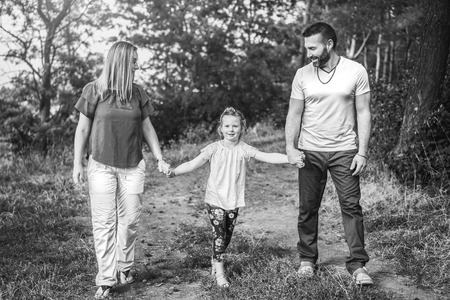 Happy lovely family have fun outdoorの写真素材