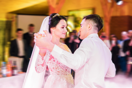 First dance of beautiful wedding coupleの写真素材