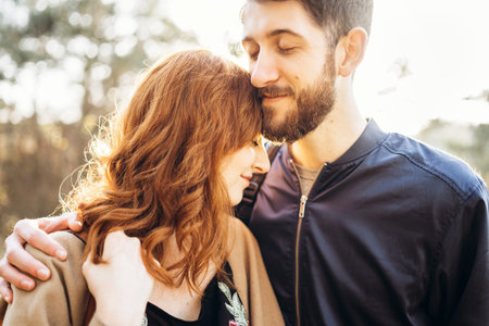 Happy young romantic couple spend time together outdoor