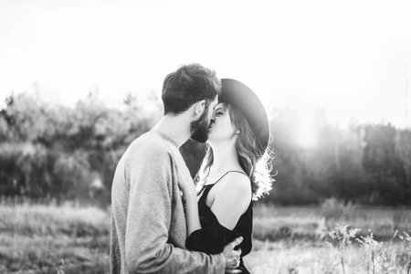 Pretty young romantic couple spend time together outdoorの写真素材