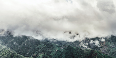 Landscape of foggy mountains in the morning, canarian islands, tenerife, spainの写真素材