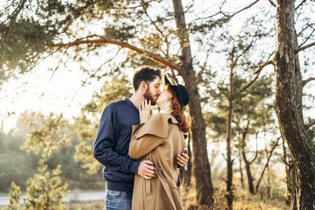 Happy young romantic couple spend time together outdoorの写真素材