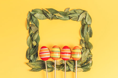 Creative flat lay photo of easter eggs on colorful background