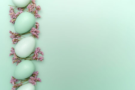 Creative flat lay photo of easter eggs on colorful background