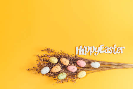 Creative flat lay photo of easter eggs on colorful backgroundの写真素材