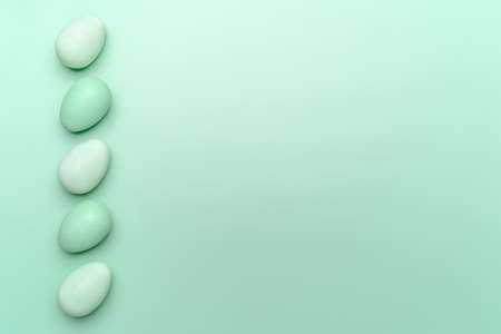 Creative flat lay photo of easter eggs on colorful backgroundの写真素材