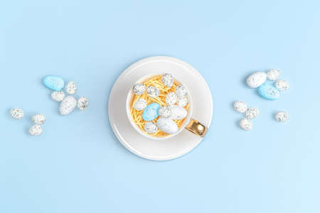 Creative layout composition of easter eggs on pastel backgroundの写真素材