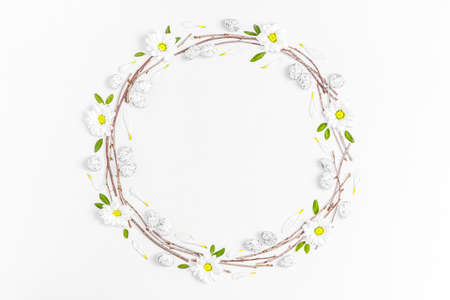 Creative layout composition of flowers and easter eggs on pastel backgroundの写真素材