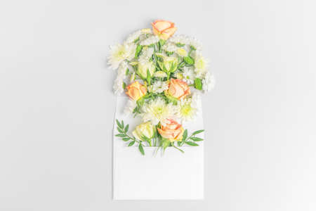 Creative layout composition of flowers on pastel backgroundの写真素材