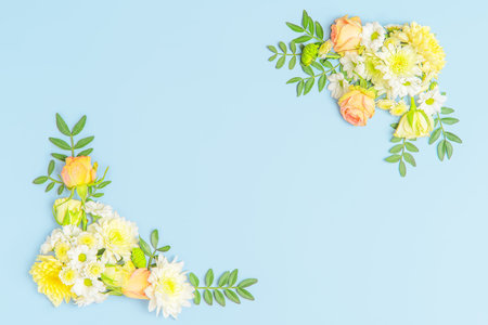 Creative layout composition of flowers on pastel backgroundの写真素材