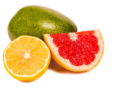 Bright variety of fruits, juicy citrus and avocado