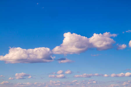 Beautiful white clouds float on the blue skyの写真素材