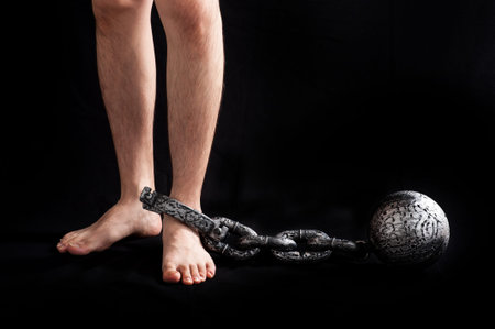 Businessman attached the shackles