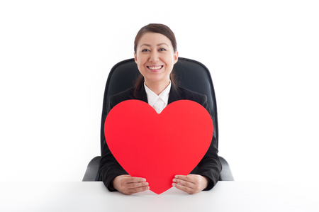 Women who have a big red heart markの写真素材