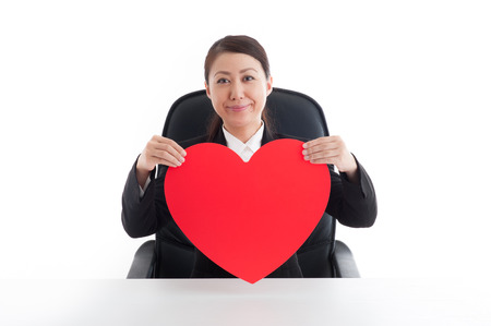 Women who have a big red heart markの写真素材