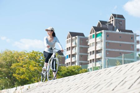 Woman riding a bicycleの写真素材
