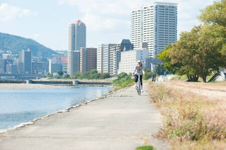 Woman riding a bicycleの写真素材