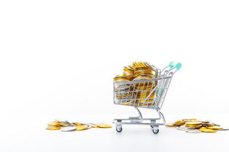 Shopping cart and gold coinsの写真素材