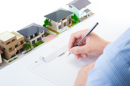 Home sales, the hands of the businessmanの写真素材