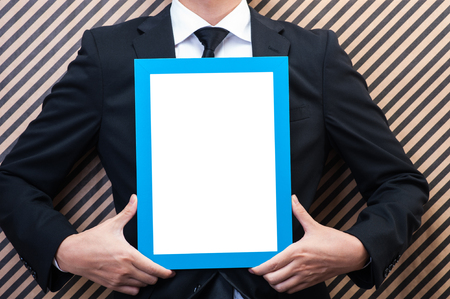 Photo frame and businessmanの写真素材