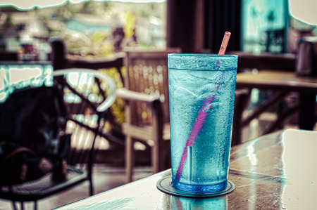 Water that has entered the blue cupの写真素材