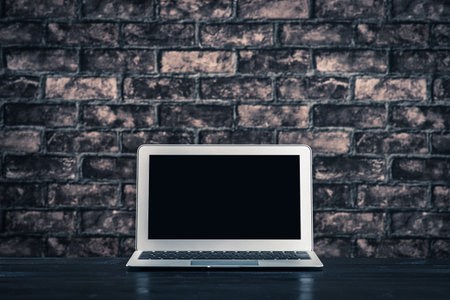 Laptop computers placed in a dark room