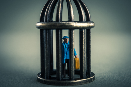 Birdcage businessmanの写真素材