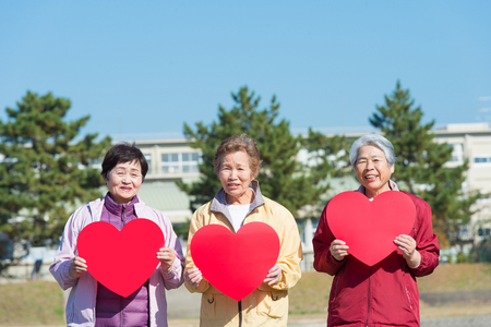 Three Japanese elderly to walk the roadの写真素材