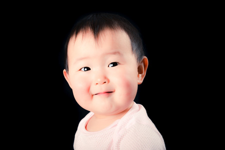 Cute baby, Black Backgroundの写真素材