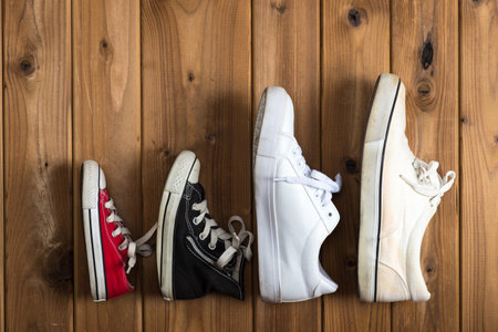 Family of sneakers, woodgrainの写真素材